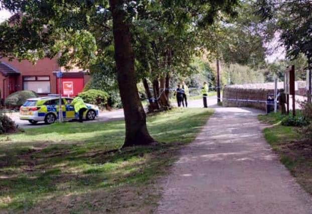 Police at the scene at King's Mill Reservoir today. Picture: Linz Gelsthorpe.