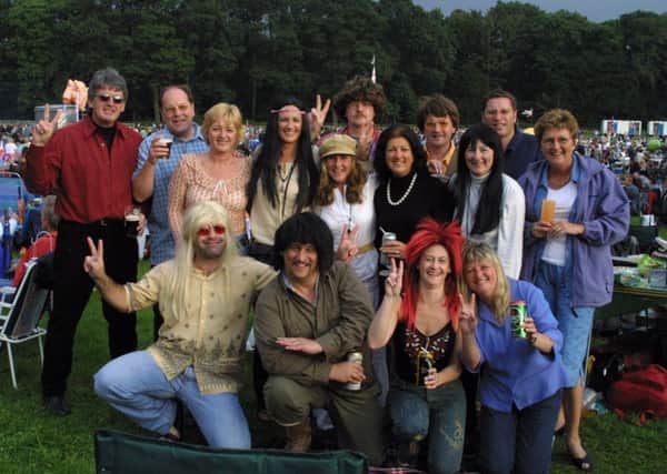 2002: A fabulous bygone shot from the concert at Clumber Park. Do you recognise anyone you know on this group shot?