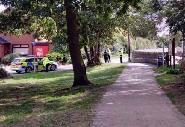 Police at the scene at King's Mill Reservoir today. Picture: Linz Gelsthorpe.
