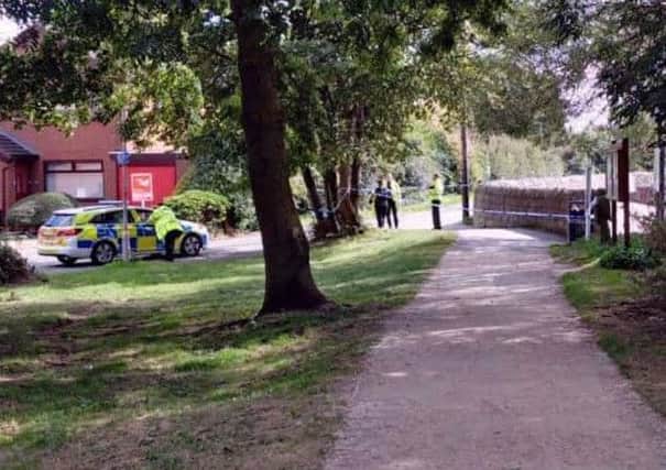 Police at the scene at King's Mill Reservoir today. Picture: Linz Gelsthorpe.