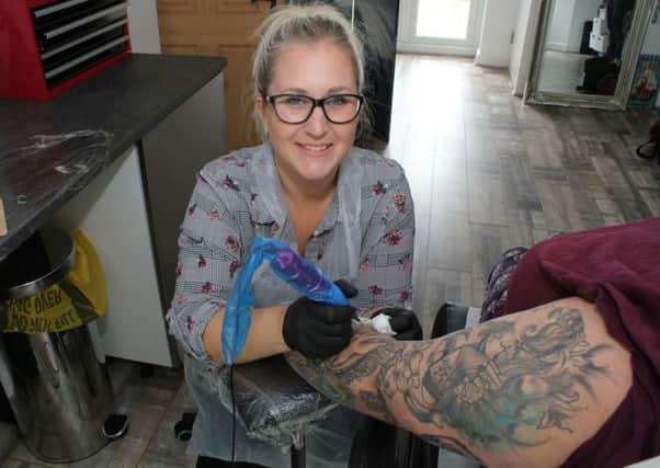 Five-star tattoo artist Helen Molloy at her Trinity Ink studio.