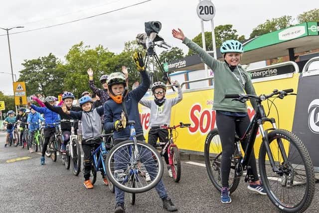 Schoolchildren on their bikes as part of the day's entertainment in Mansfield.