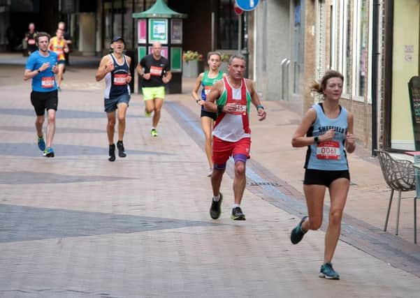 The Mansfield 10K Race heads round the town centre, Mansfield, United Kingdom, 16th September 2018. Photo by Glenn Ashley.