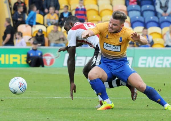Mansfield Town v Exeter City.
Alex MacDonald in first half action.
