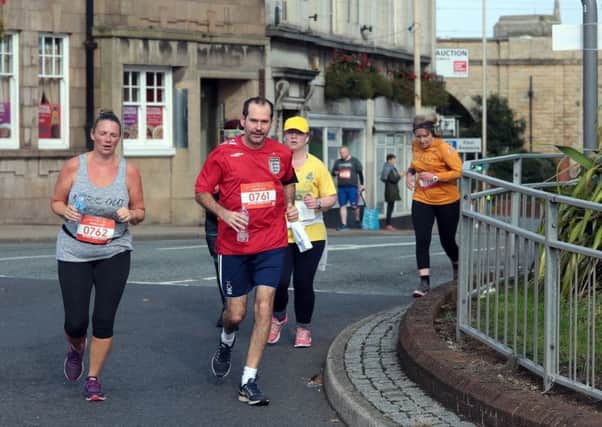 The Mansfield 10K Race heads round the town centre, Mansfield, United Kingdom, 16th September 2018. Photo by Glenn Ashley.