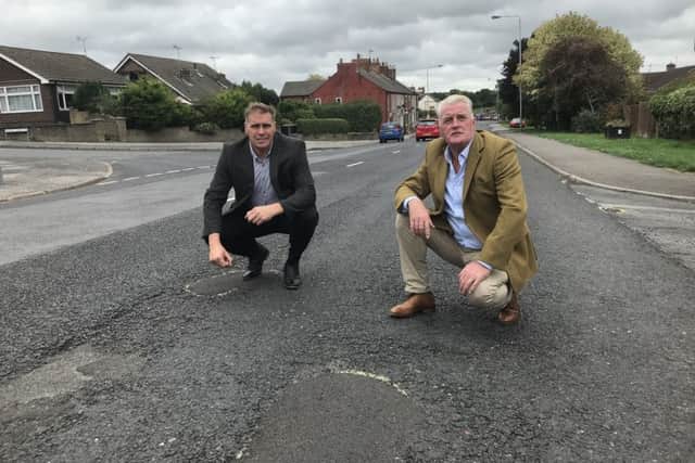Coun David Martin, who is pictured with resident, Arnie Hankins