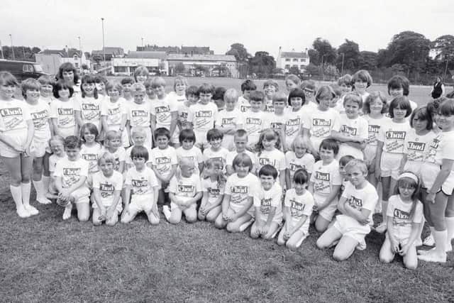 1981: This group of children look set for a day of fun at the Mansfield Carnival. Wonder what they are all up to now...