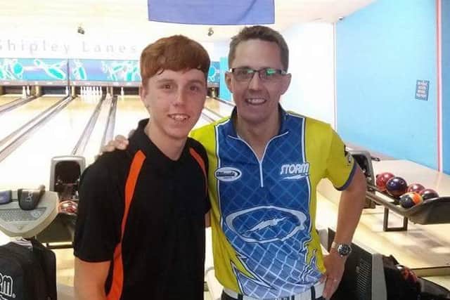 Tom is pictured with Martin Larsen, a professional ten pin bowler from Sweden