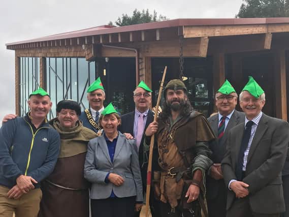 BBC One Show's Mike Dilger, TV's Phil Rose (aka Friar Tuck), and county council representatives at the new visitor centre.