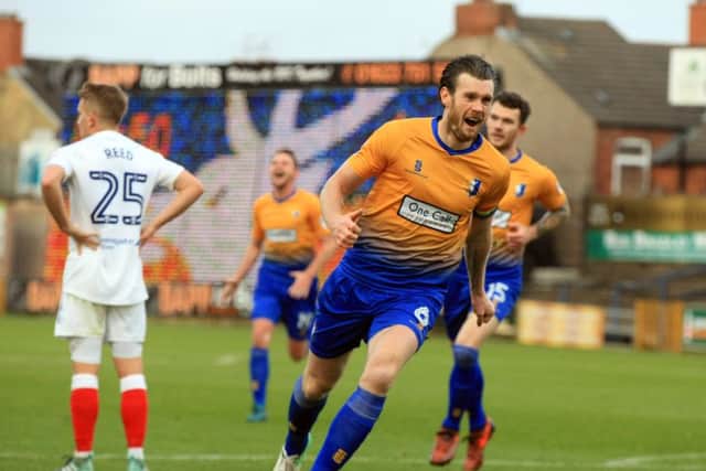 Mansfield Town v Chesterfield FC at the One Call Stadium. Sky Bet League 2 - November 25th 2017. Mansfield player Zander Diamond scores. Picture: Chris Etchells