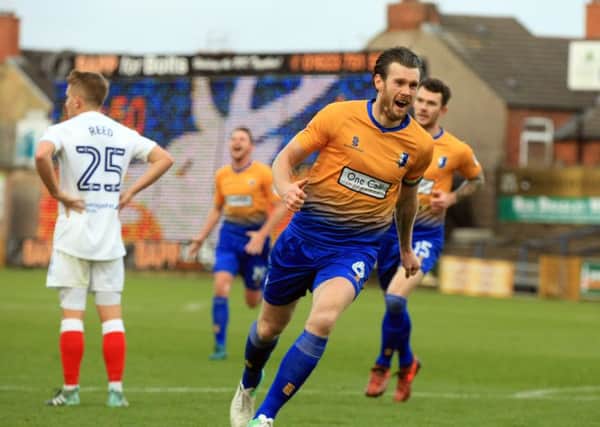 Mansfield Town v Chesterfield FC at the One Call Stadium. Sky Bet League 2 - November 25th 2017. Mansfield player Zander Diamond scores. Picture: Chris Etchells