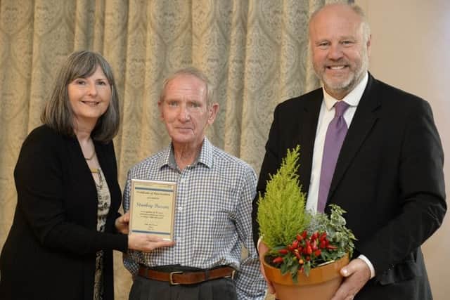 Stanley Pascoe, flanked by trust duo John MacDonald and Jill Smallwood.