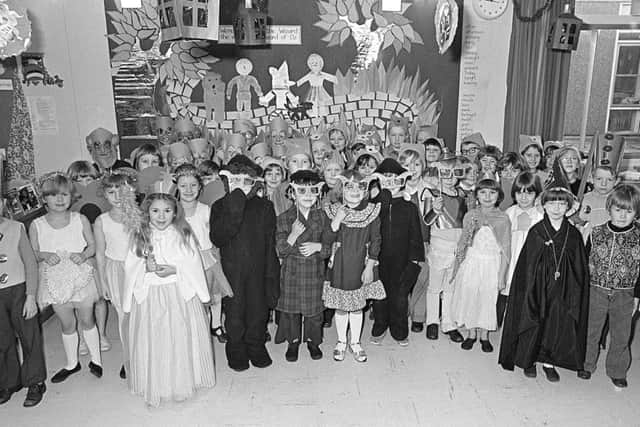 1980: Another great shot showing pupils from Bull Farm School in Mansfield. This smiley bunch are posing for this snap during their concert. Do you recognise anyone?