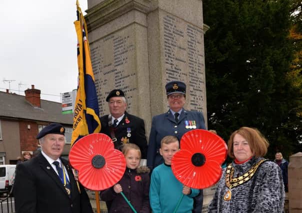 The launch of the Poppy Appeal at Kirkby's war memorial in 2015.