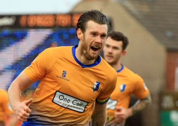 Mansfield Town v Chesterfield FC at the One Call Stadium. Sky Bet League 2 - November 25th 2017. Mansfield player Zander Diamond scores. Picture: Chris Etchells