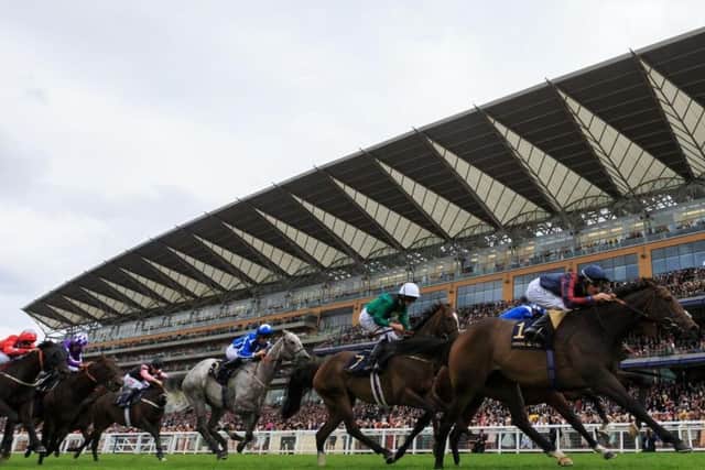 The magnificent backdrop of the grandstand at Ascot, home of Qipco British Champions Day.
