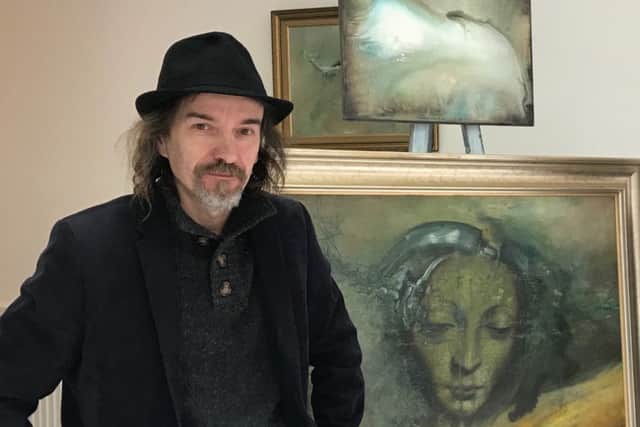 Artist Gregory Kaminski in his Mansfield gallery.