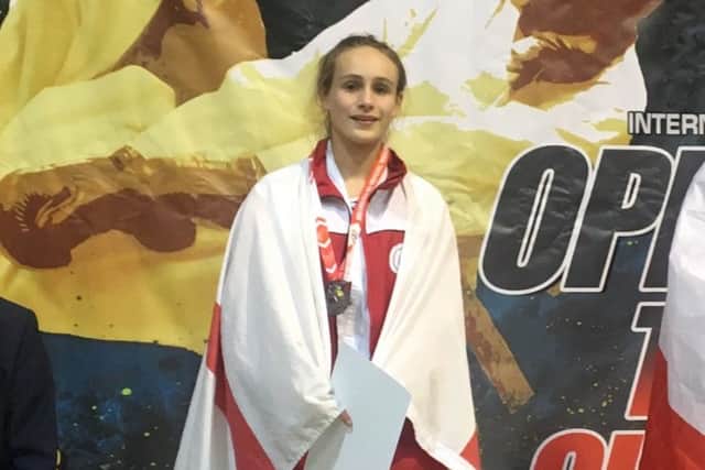 Katie Scales with her silver medal.