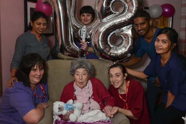Margaret Young celebrates her 108th birthday at Ashcroft Care Home, Sutton, Margaret is pictured with staff members