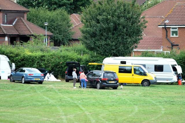 Travellers on Sutton Lawn adjacent to properties on Bramley Court.