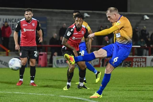 Mansfield Town's Neal Bishop drives home the opening goal for the Stags: Picture by Steve Flynn/AHPIX.com, Football: Skybet League 2 match Morecambe -V- Mansfield Town at Globe Arena, Morecambe, Lancashire, England on copyright picture Howard Roe 07973 739229