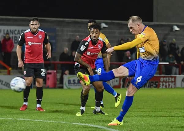 Mansfield Town's Neal Bishop drives home the opening goal for the Stags: Picture by Steve Flynn/AHPIX.com, Football: Skybet League 2  match Morecambe -V- Mansfield Town at Globe Arena, Morecambe, Lancashire, England on copyright picture Howard Roe 07973 739229
