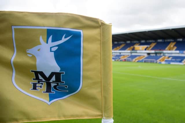 Mansfield host MK Dons at the One Call Stadium.