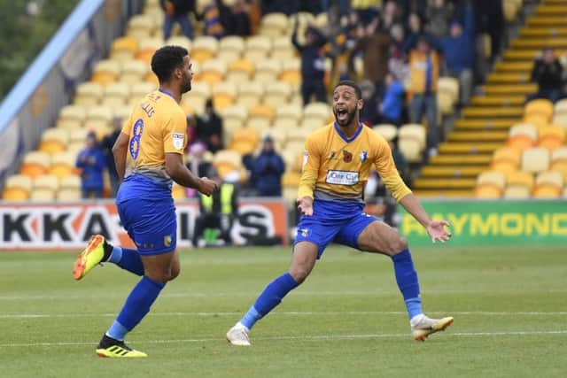 Mansfield Town's Jacob Mellis celebrates scoring with CJ Hamilton: Picture by Steve Flynn/AHPIX.com, Football: Skybet League 2  match Mansfield Town -V- MK Dons at One Call Stadium, Mansfield, Nottinghamshire, England on copyright picture Howard Roe 07973 739229