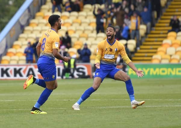 Mansfield Town's Jacob Mellis celebrates scoring with CJ Hamilton: Picture by Steve Flynn/AHPIX.com, Football: Skybet League 2  match Mansfield Town -V- MK Dons at One Call Stadium, Mansfield, Nottinghamshire, England on copyright picture Howard Roe 07973 739229