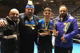 Mansfield boxer Nico Leivars with his coaches after his success in Sweden.