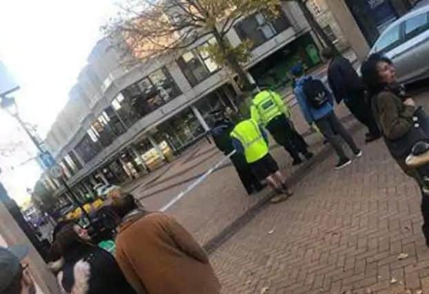 The police cordon remains in place