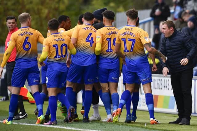 Mansfield Town manager David Flitcroft celebrates with his team after they go 1-0 up: Picture by Steve Flynn/AHPIX.com, Football: Skybet League 2  match Mansfield Town -V- MK Dons at One Call Stadium, Mansfield, Nottinghamshire, England on copyright picture Howard Roe 07973 739229