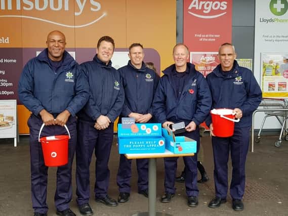Mansfield fire crews sell poppies for Royal British Legion