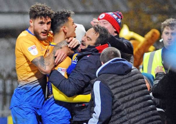 Mansfield Town v  Grimsby Town.
Tyler Walker celebrates with fans after equalising in the second half.