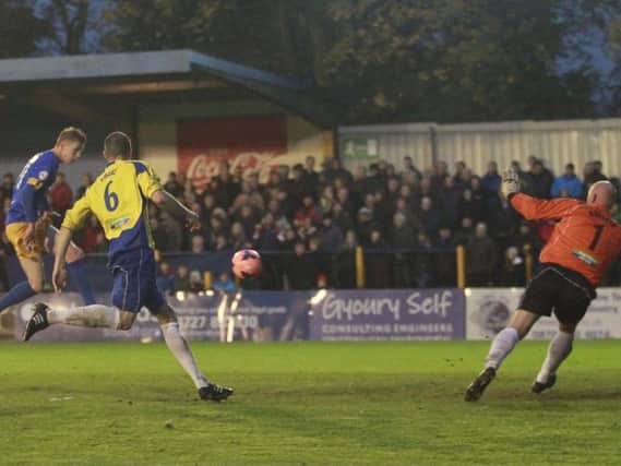 Sam Clucas (left) fires home one of his goals at St Albans. Photo by Richard Parkes.