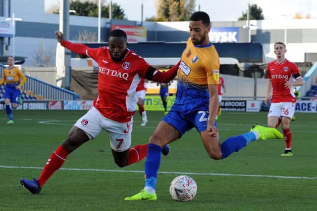 Mansfield Town vs. Charlton Athletic        CJ Hamilton gets a shot off early in the second half.