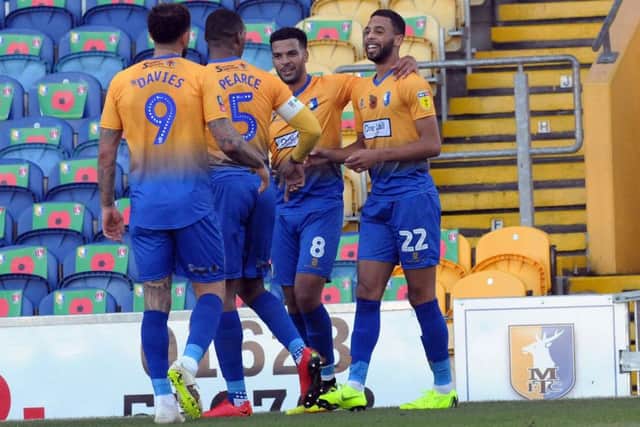 Mansfield Town vs. Charlton Athletic
CJ Hamilton celebrates his first half goal.