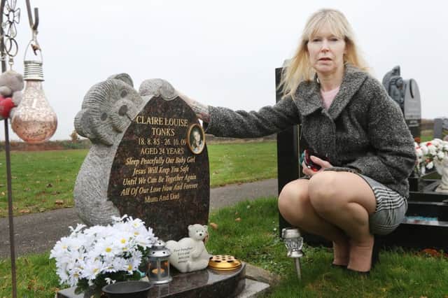 Lorraine Oliver complaining about the theft of items from her daughter's grave