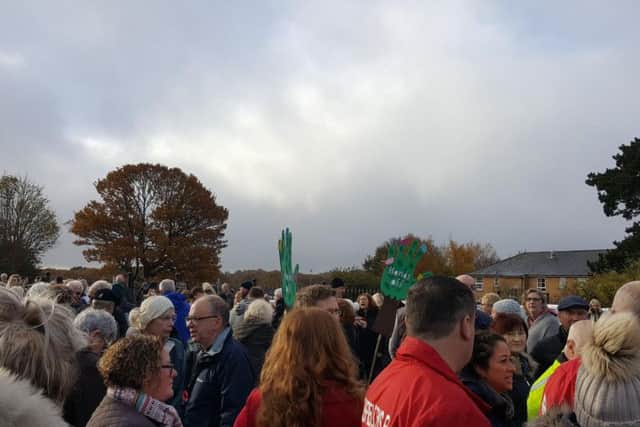 Hundreds gathered to protest the park's closure on Saturday.
