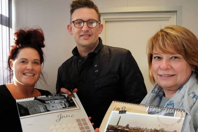 Emma Olden, Mark Newland and Dawn Justice with the Selston and Underwood calendar.