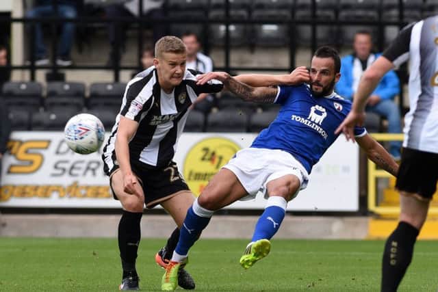 Ryan Yates battles for the ball for Notts County against Chesterfield