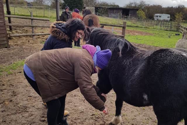 Checking a horse's legs was one of the duties on the course.