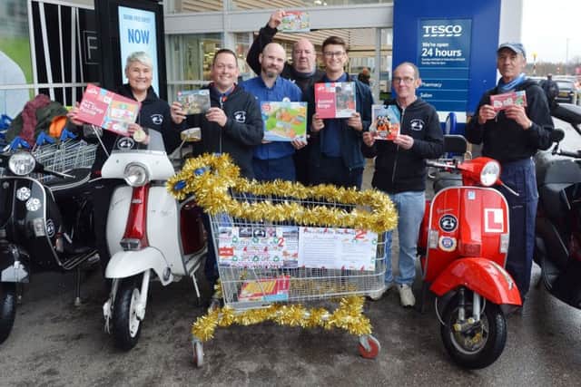 Sutton In Ashfield Scooter club getting ready for their annual ride delivering presents to Kings Mill Hospital.