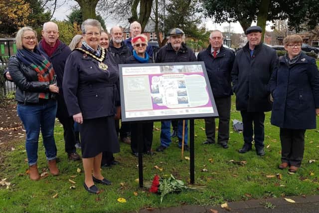 The new information panel is unveiled  at Sutton by the chairman of Nottinghamshire County Council, Coun Sue Saddington, and members of the Pentrich Revolution Group.
