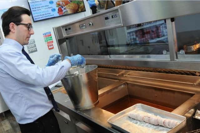 Theo preparing the battered pig in blanket.