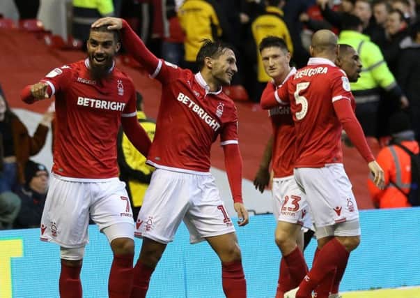 Lewis Grabban celebrates after scoring his second goal, during the game against Ipswich Town FC at The City Ground Nottingham on 01-12-18 Image Jez Tighe
