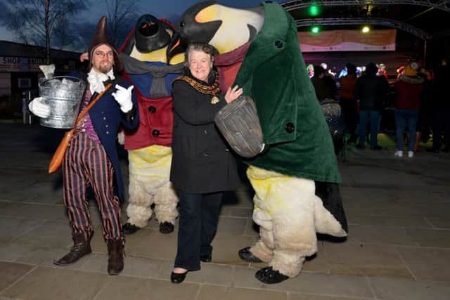 Chairman of Ashfield District Council, Councillor Glenys Maxwell meets some penguins