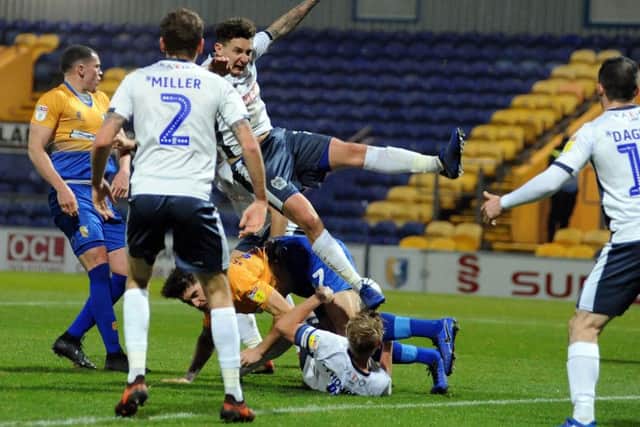 Mansfield Town v Bury.
Ryan Sweeney is sandwiched between the Bury defence.