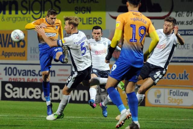 Mansfield Town v Bury.Timi Elsnik lines up shot early in the second half.
