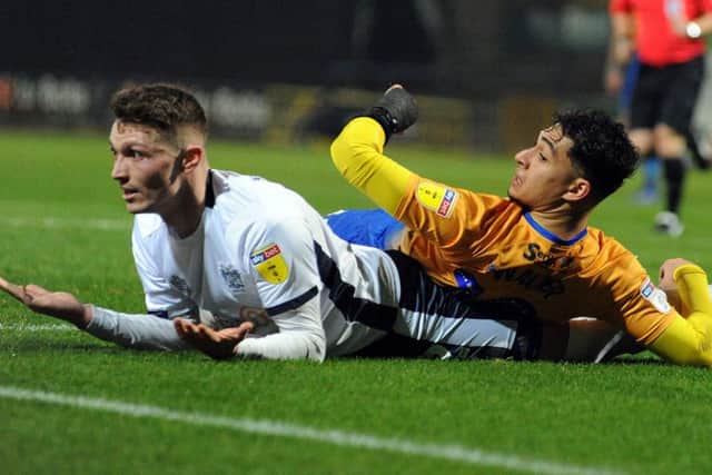 Mansfield Town v Bury.Tyler Walker looks for a penalty decision in the second half.